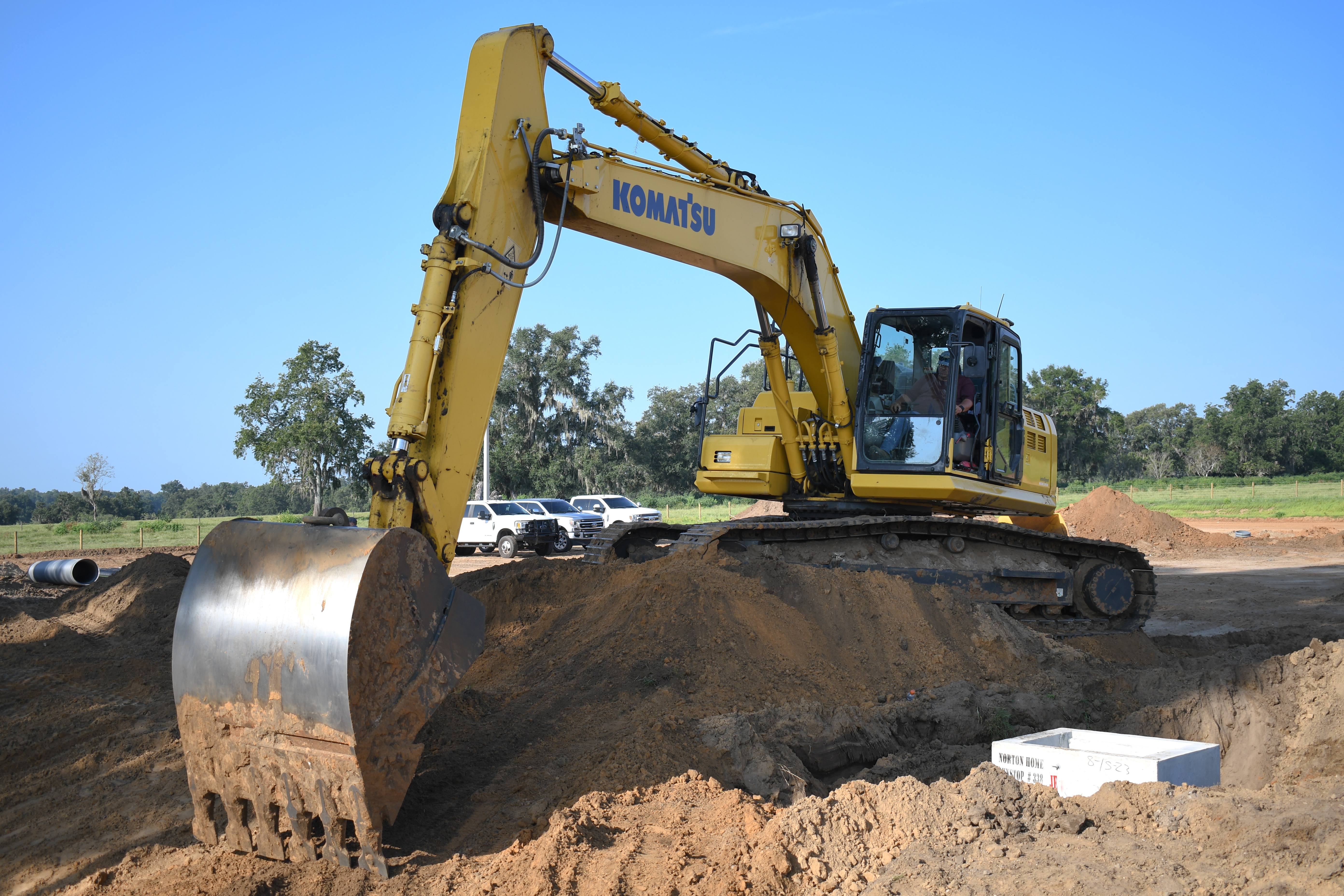 Komatsu excavator on excavation and utilities site — Columbia County, FL